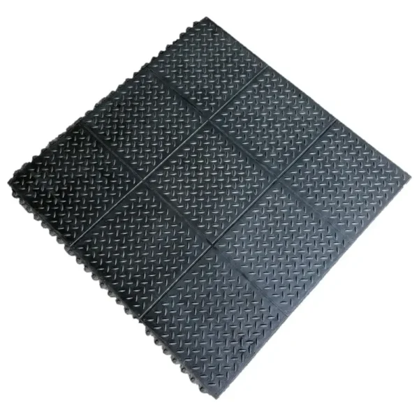 A single Interlocking Chequer Plate Gym Mat in black, featuring a diamond plate texture and visible connecting edges, is displayed against a white background.
