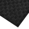 Close-up of the Forklift Mat, a black textured doormat with a raised chequered pattern, shown angled against a white background.