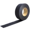 A partially unrolled roll of Anti-Slip Comfortable Tape shows its black, textured surface, sticky underside, and cardboard core.