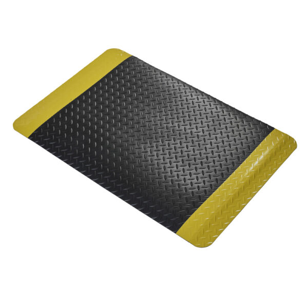 The Premium Anti-Fatigue Mat is a rectangular black floor mat featuring a diamond plate texture and wide yellow safety borders on two opposite edges.
